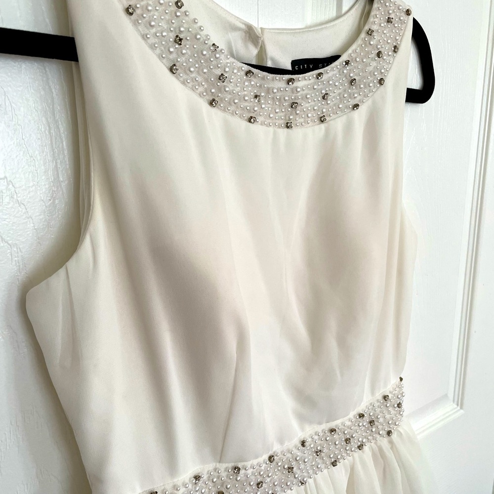 White dress perfect for engagement pictures or homecoming.